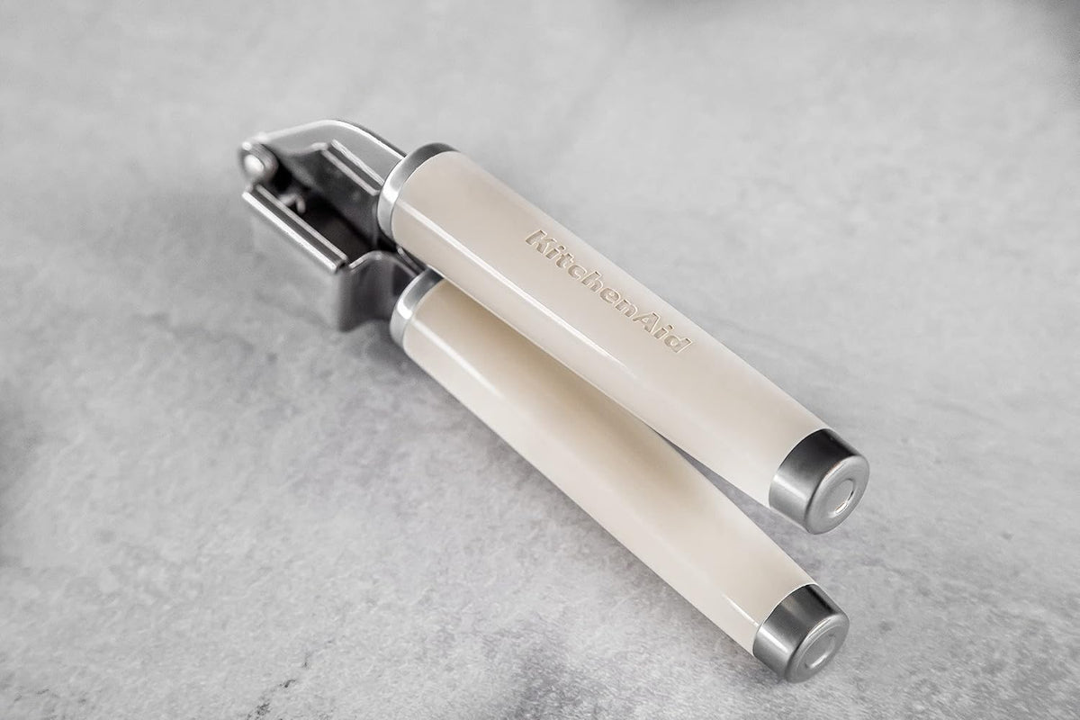 KitchenAid Garlic Press Crusher, Strong Stainless Kitchen Utensil, Removable Basket, Almond Cream